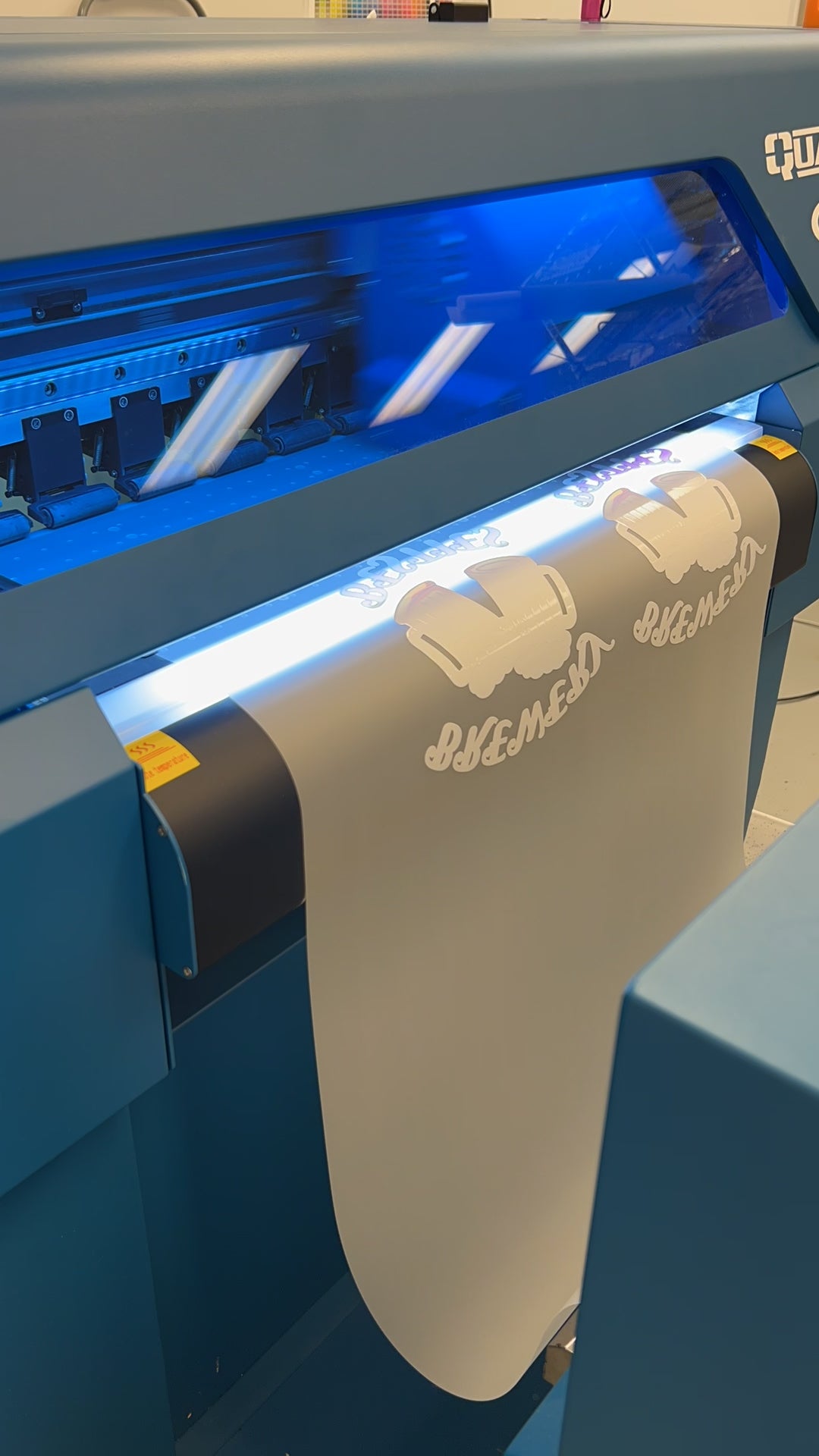 video of Custom Gang sheets , DTF Transfers, DTF Prints, image on printer