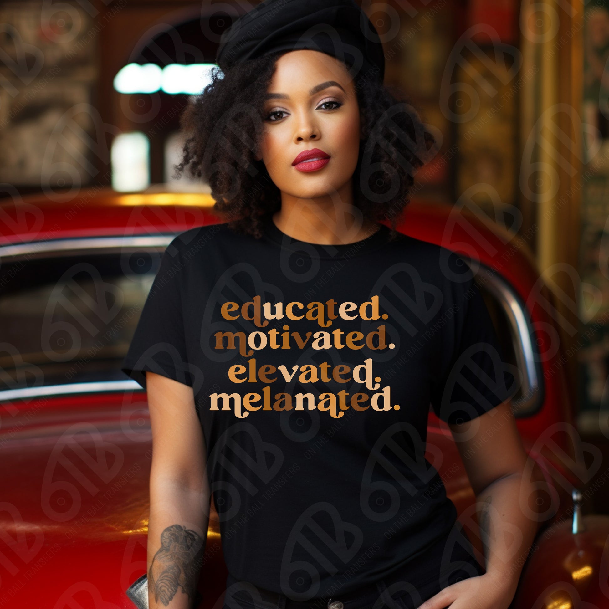 Woman wearing a black t-shirt with motivational text, sitting in a car.