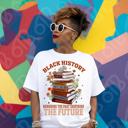 Person wearing a white t-shirt with 'Black History' design against a colorful abstract background