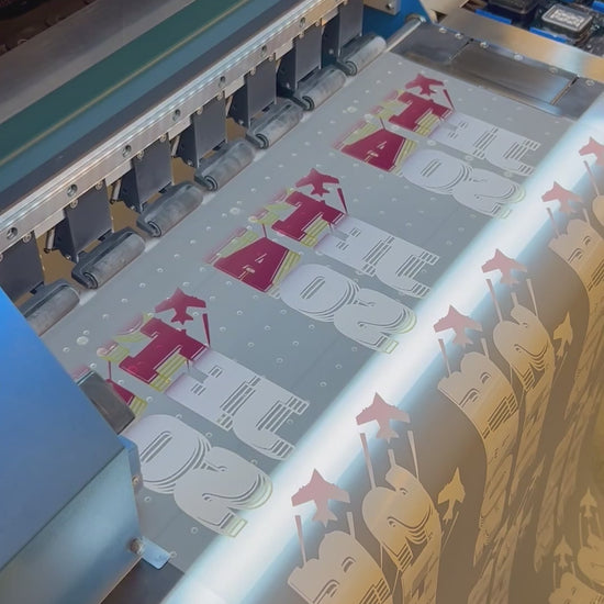 video of a direct to film printer printing transfers