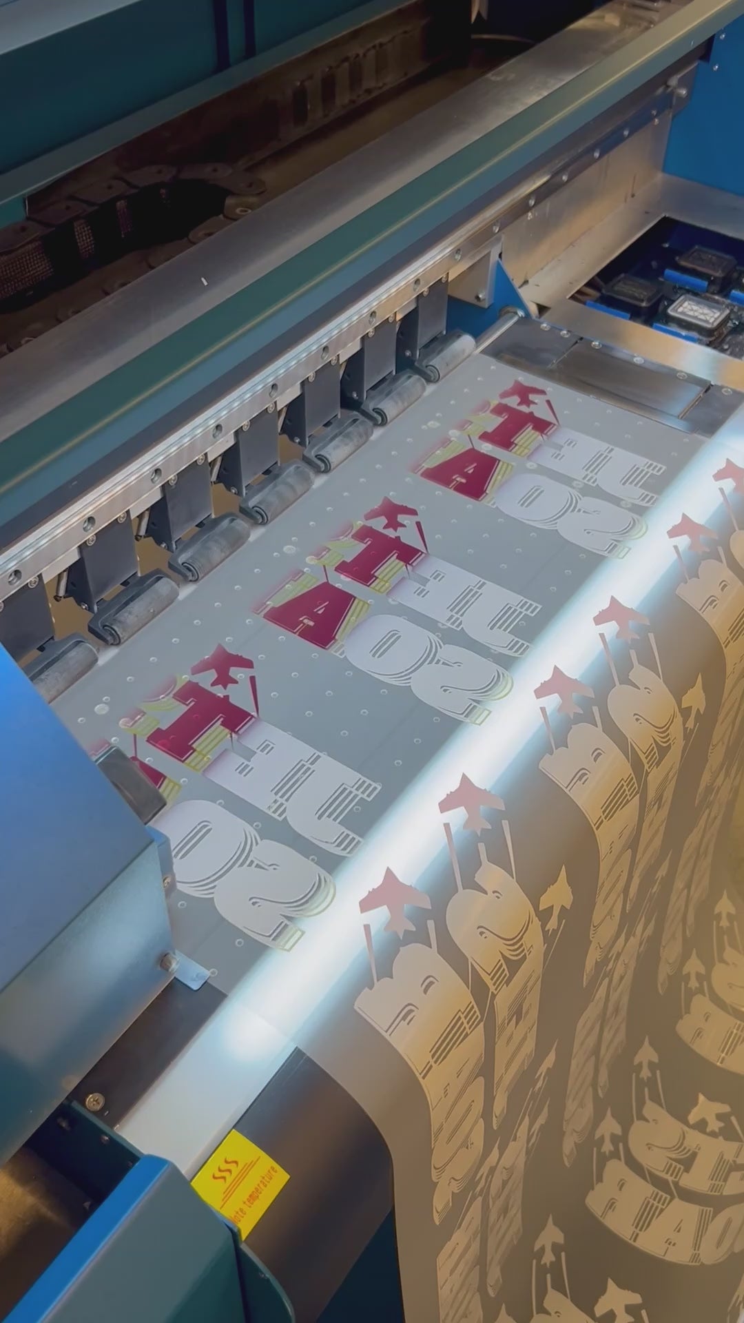 video of a direct to film printer printing transfers